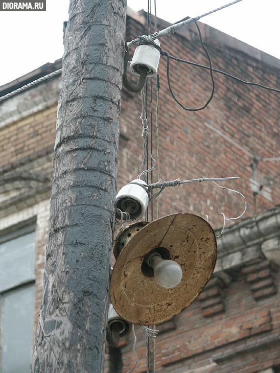 Insulators and street lamp on wooden pole, Rostov-on-Don, Russia (Library Diorama.Ru)